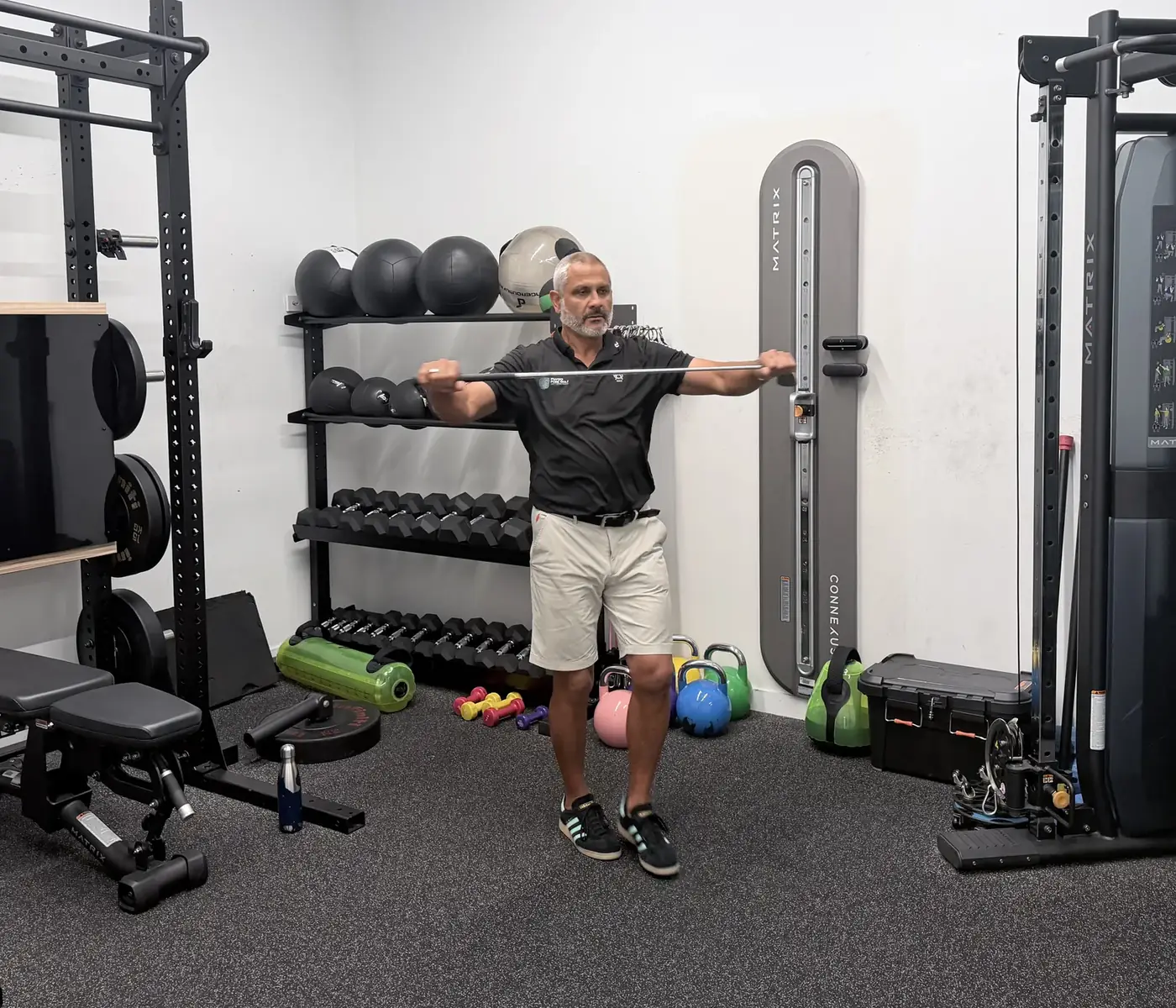 A wide grip on a golf club held out in front with the arms stretched out