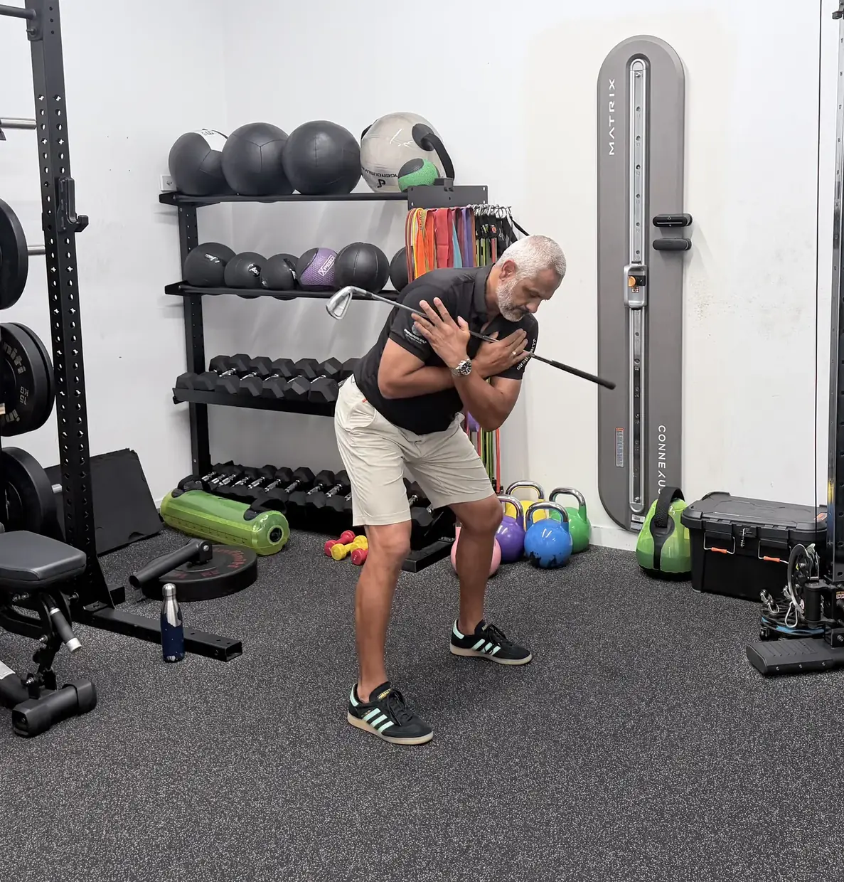 In golf posture with a club across the chest, the chest turned to one side