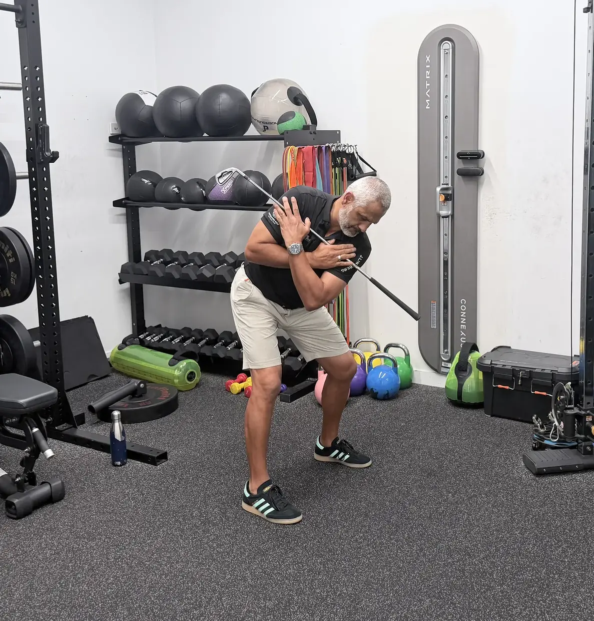 In golf posture with a club across the chest, the chest turned to the other side